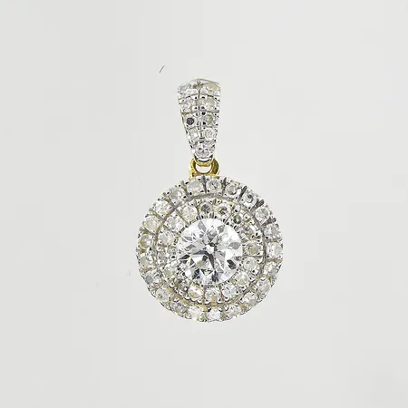 Hänge med diamanter ca 0,40ctv, längd 14 mm, bredd 8 mm, 18K. Vikt: 1,4 g