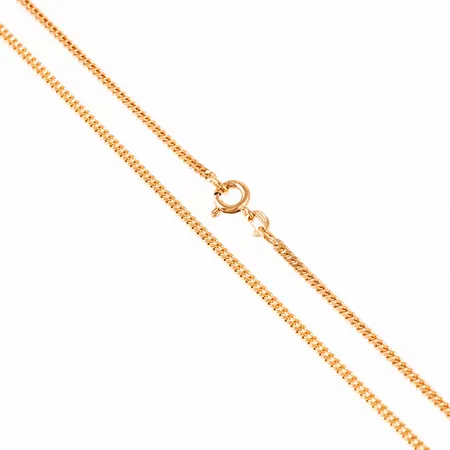 Kedja pansar i 18K guld. Den är 70 cm lång, 2 mm bred och väger 11,4g. Springring. Från Balestra. Fint skick.