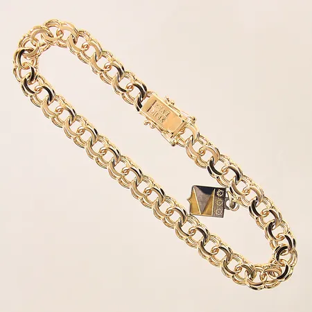 Armband Bismarck med integrerad berlock, längd 20cm, bredd 7mm, 18K Vikt: 19,5 g
