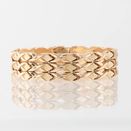 Armband längd ca 19.5 cm, bredd 16.9 mm, 18k. Vikt: 24,7 g