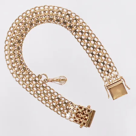 Armband, X-länk, en berlock med pärla, längd 18,5cm, bredd 11mm, Mikkov Handelsfirma, År 1960, bucklig berlock, 18K Vikt: 17,9 g