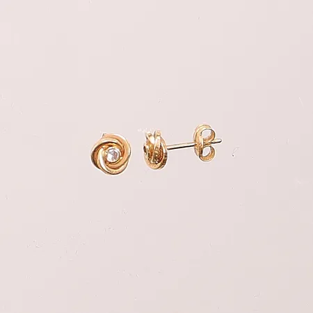 Ett par örhängen, 5mm, vita stenar, 18K 0,7g.