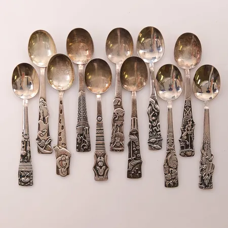 11 Kaffeskedar 11cm,olika motiv Silver 150,2g 