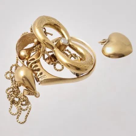 Diverse defekt guld, 18K, vikt 12,39g.