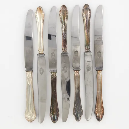 Sju knivar, 25,6cm, Jernbolaget Eskilstuna, blad i stål, skaft silver, Vikt: 484,5 g