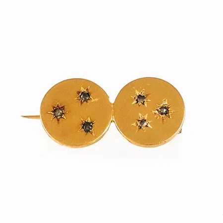 Litet brosch i 18K guld med sex rosenstenar / diamanter. Det är 17,5 x 8,7 mm och väger 1,9g. 