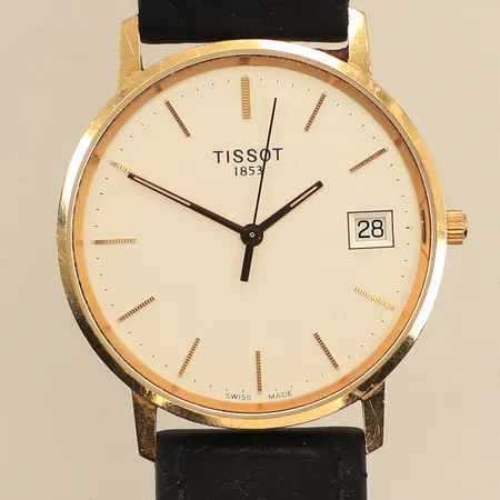 Armbandsur Tissot, 18K, Ø33mm, quartz, datum, gravyr, slitet läderarmband, inga övriga tillbehör