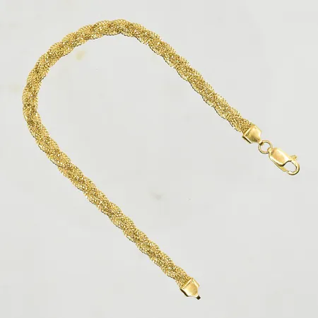 Armband, flätad modell, längd 19 cm, bredd 4 mm, 21K. Vikt: 6,4 g
