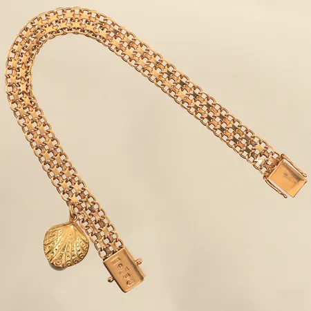 Armband X-länk med en berlock, längd 19cm, bredd ca 5,8mm, Ädelsmycken Aktiebolag, år 1959, 18K Vikt: 16,5 g