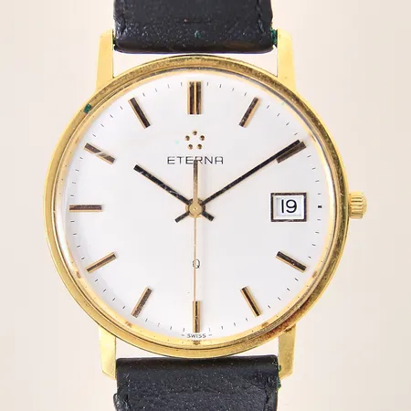 Herrur Eterna, 18K, quartz, numrerad: 158.2141.68, datum, läderband ej orginal, repigt glas, gravyr, repig boett, fungerar ej, batteribyte krävs, inga tillbehör, 18K 