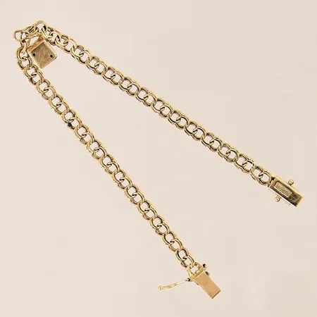Armband Bismarck med en berlock, längd 18cm, bredd 4,5mm, en låsåtta saknas, GFAB, 18K  Vikt: 7,2 g
