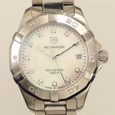 Damur Tag Heuer Aquaracer, Ø32mm, stål, quartz, datum, pärlemorurtavla med diamantindex, ref: WBD1314.BA0740, snr: RTM1571, stållänk, längd ca 15cm, viklås, certifikat, manual, box, ytterkartong, går ej behov av batteribyte