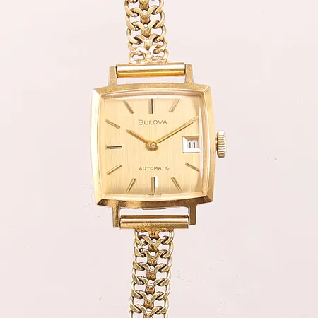 Damur Bulova 18K, 20mm, automatisk, datum, fiskbenslänk i 18K, totallängd ca 18cm, bruttovikt 24,9g.