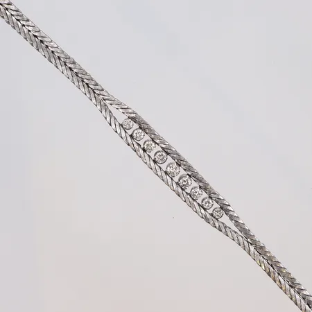 Armband med diamanter, 2xca0,05ct, 2xca0,07ct, 2xca0,08ct, 2xca0,09ct, 1xca0,12ct, vitguld, 18K  Vikt: 19,9 g