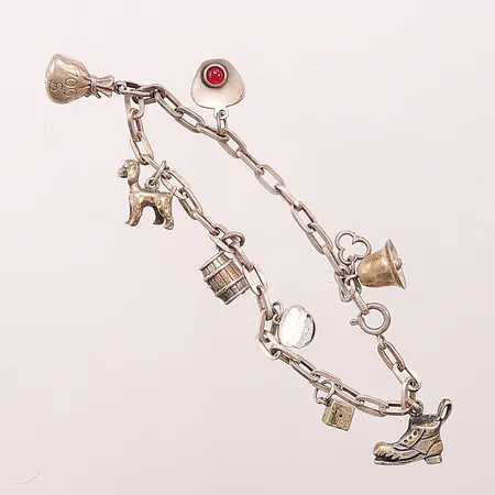 Armband med 8 berlocker,stl 18cm.830/1000 Silver 17,8g  