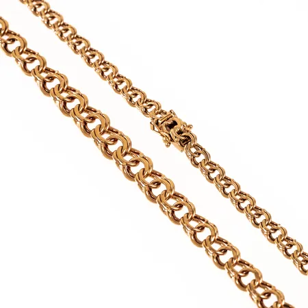 Colliér i 18K guld. Det är 45,5 cm långt, 4,7 - 7,4 mm brett och väger 24,6g. Kistlås. Stämplad Q9(1966), TBG (Bergmans Guldvaror, Arboga), 18K & kattfot.  