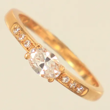 Ring med vita stenar, stl 17½, bredd ca 2-4mm, BEH, år 1986, 18K Vikt: 2,5 g