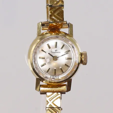 Damur Technos Ø18mm 18K, manuell uppdragning, guldfärgad stållänk, guld i boetten, bruttovikt 20,7g