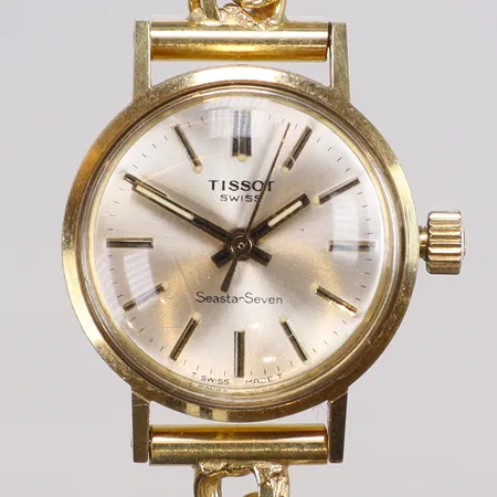 Damur Tissot SeastarSeven 18K Ø22mm, manuell uppdragning, helguld, med bismarcklänk 18K bruttovikt 24,5g