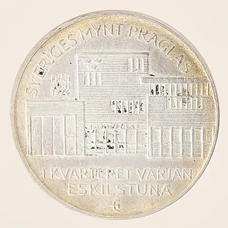Mynt, I kvarteret Värjan Eskilstuna, Ø32mm, silver 830/1000 Vikt: 18,1 g