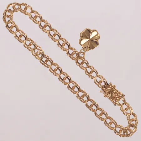 Armband bismarck med integrerat hänge, längd 18,5cm, bredd 5mm, glapp i lås, defekt, 18K   Vikt: 7,7 g