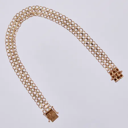 Armband x-länk, längd: ca 19cm, bredd: ca 8mm, Styletta Guldvaruaktiebolaget år 1969, 18K Vikt: 9,2 g