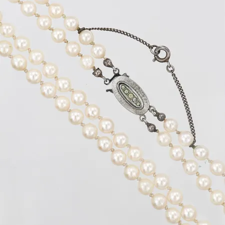 Pärlcollier med odlade saltvattenpärlor, dubbelradigt, längd: 45 cm, Ø 5 mm, lås i silver med vita stenar. Vikt: 0 g