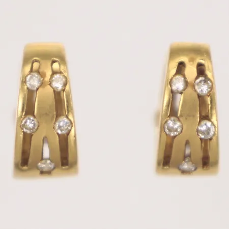 Ett par örhängen med briljantslipade diamanter ca 0,20ctv, 18K längd 12mm, bredd 6,3mm, 18K  Vikt: 5,3 g