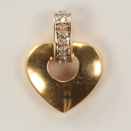 Hänge hjärta med vita stenar, 15 x 12 mm  inkl ögla, 18K  Vikt: 1,5 g