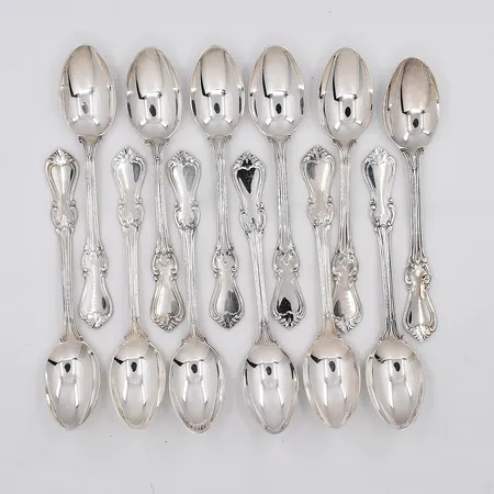 12 Kaffeskedar, modell Olga, längd 12,3cm, schatull medföljer, silver 830/1000 Vikt: 193,8 g