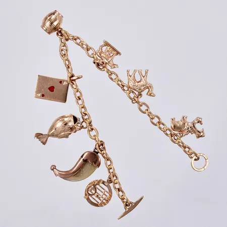 Armband, Ankarlänk med åtta berlocker, längd: ca 18,5cm, bredd:- ca 4mm, 1 berlock är 8K, 18K  Vikt: 24,2 g