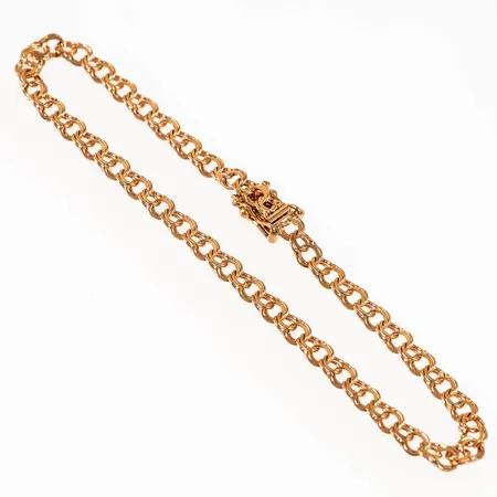 Armband, Bismarck i 18K guld. Det är 18,5 cm långt, 3,7 mm brett och väger 4,6g. Fint skick. Stämplad P10 (1989), TC (Tore Clareus), 18K & kattfot. 