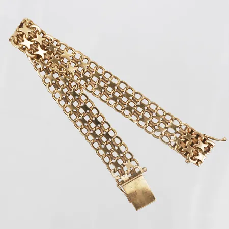 Armband, X-länk, Svenska Guldvaruaktiebolaget, Stockholm år 1962, längd: 20 cm, bredd: 13 mm, 18K guld. Vikt: 32,7 g