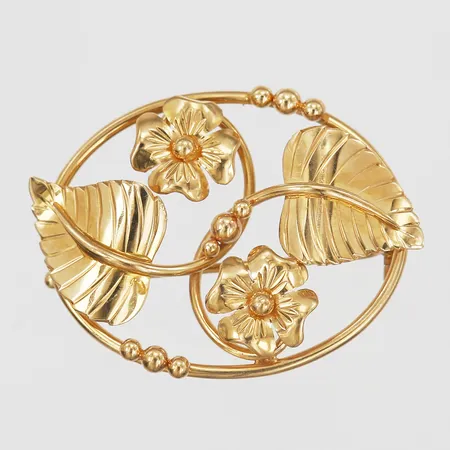 Brosch år 1952 otydliga stämplar, längd ca 35mm, bredd ca 26mm, 18K Vikt: 6,3 g