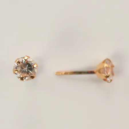 Ett par örhängen 18K med vita stenar, Ø 5 mm, saknar lås, 18K  Vikt: 0,7 g