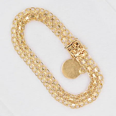 Armband X-länk, 19,5cm, bredd 9,3mm, berlock Ø 13,8mm, graverad, 18K Vikt: 14,1 g