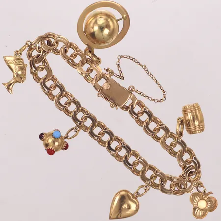 Armband bismarck med sex integrerade hängen, längd ca 18cm, bredd 8mm, stenar, något bucklig, 18K  Vikt: 31,3 g