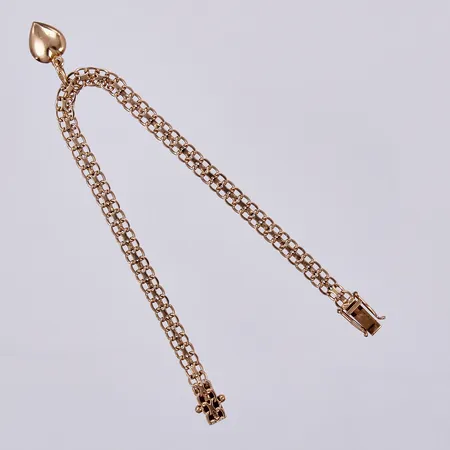Armband Bismarck med en berlock hjärta, längd: ca 19,5cm, bredd: ca 5mm, ESM, Svedboms Guldsmeds Ab Hov, Vetlanda, år 1968, 18K  Vikt: 9,7 g