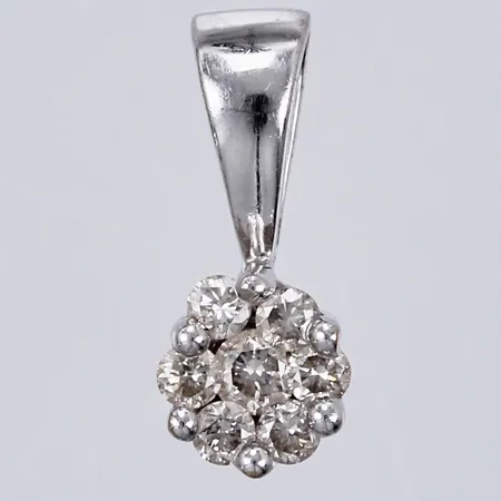 Hänge med sju diamanter ca 1x0,03ct, 6x0,01ct, längd: ca 1cm, bredd: ca 4mm, GHA, vitguld, 18K  Vikt: 0,5 g