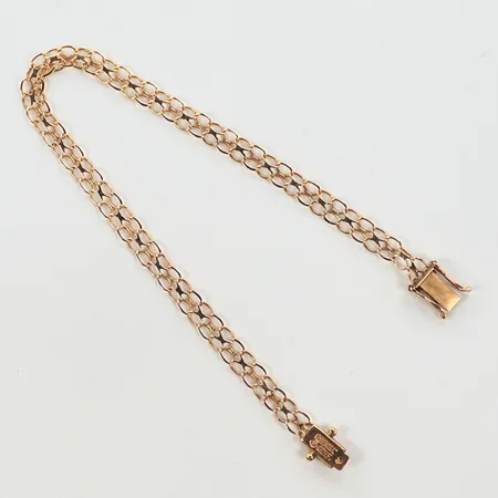 Armband X-länk, längd 19cm, bredd 5mm, sliten, 18K Vikt: 4,1 g