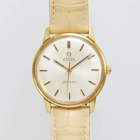 Herrur Omega Seamaster, doublé, automatisk, 34,3mm, boettnr: 165.002, Cal. 552, snr: 22983351, ca 1965, repigt glas, personlig gravyr daterad 1967, läderband samt bygelspänne ej original, inga tillbehör. 