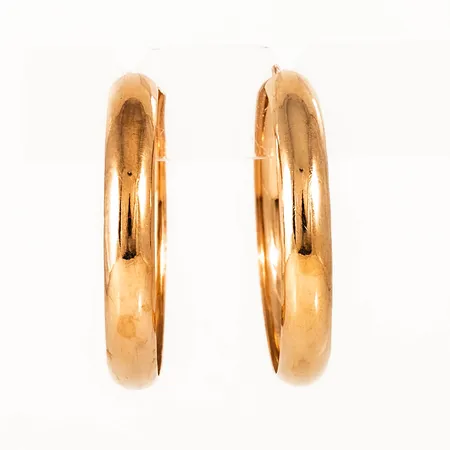 Creoler Ø 27 mm i 18K guld. De är 4 mm breda och väger 2,5g. 