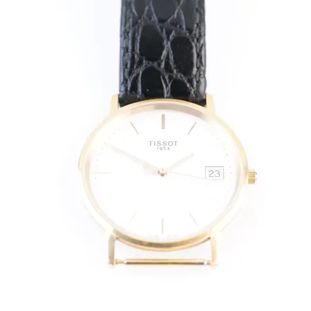 Herrur Tissot, quartz, ca 33mm, 18k, batteribyte krävs, gravyr bakboett