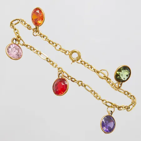 Armband med 5 berlocker med cubic zirconia samt glas i olika färger Ø11mm, längd: 19,7cm, en extra ögla för berlocker, 18K, bruttovikt 8,8g Vikt: 8,8 g
