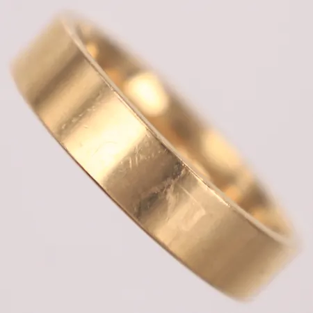 Ring slät, stl 22, bredd 6mm, 18K  Vikt: 11,9 g