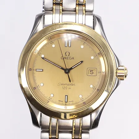 Herrur Omega Seamaster 120, Ø36mm, quartz, datum, guld/stål, ref DA.196.1501, serienummer 54950049, länk 151/823, kort länk ca 13cm, smärre kosmetiskt slitage, med serviceetui och servicekvitto från Jarl Sandin 2025, krona, urtavla, och visare utbytta under service originaldelar medföljer Vikt: 0 g