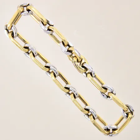 Armband, längd 19cm, bredd 7mm, delvis vitguld, 18K  Vikt: 14,2 g