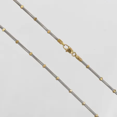 Collier, tvåfärgad, längd: 42 cm, bredd: 1,5 - 2 mm, italienska stämplar, 18K guld. Vikt: 11,9 g
