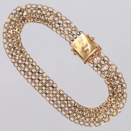 Armband X-länk, längd 19cm, bredd 9,8mm, glapp i lås, 18K Vikt: 10,3 g