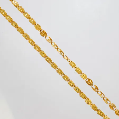 Collier, längd: 85cm, bredd: 5,5mm, några länkdelar skadade, 21K Vikt: 49,2 g
